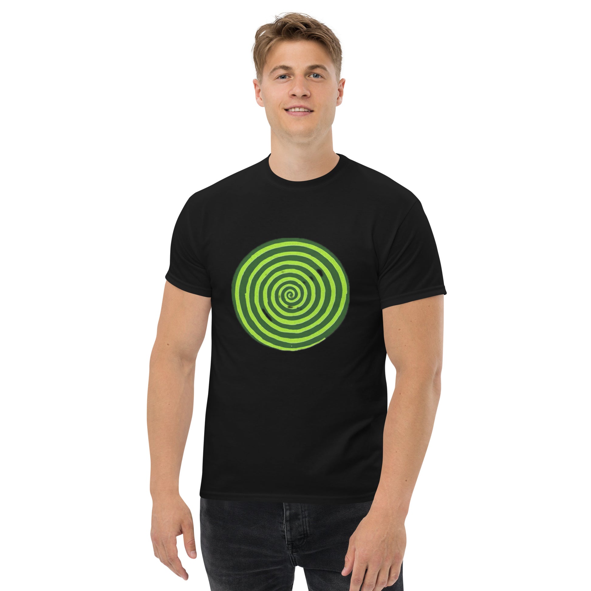 Person wearing a black t-shirt with a green spiral design on a white background