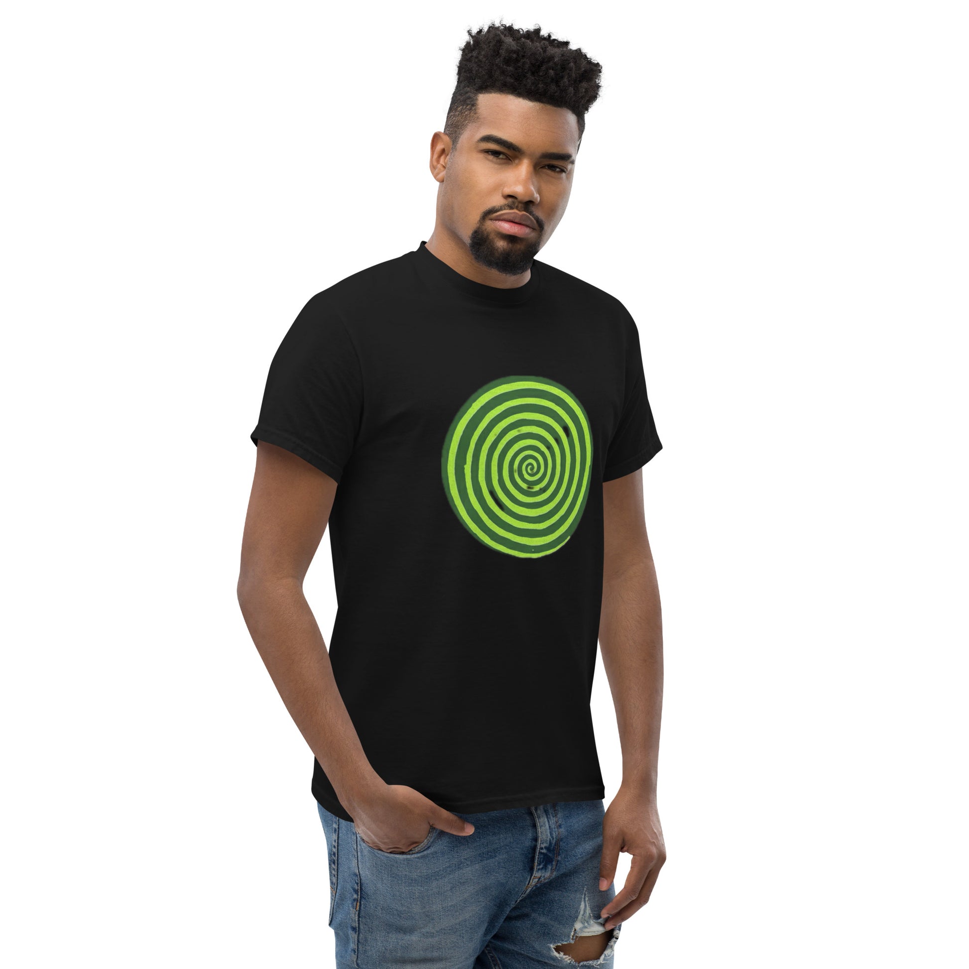 Man wearing a black t-shirt with a green spiral design on a white background